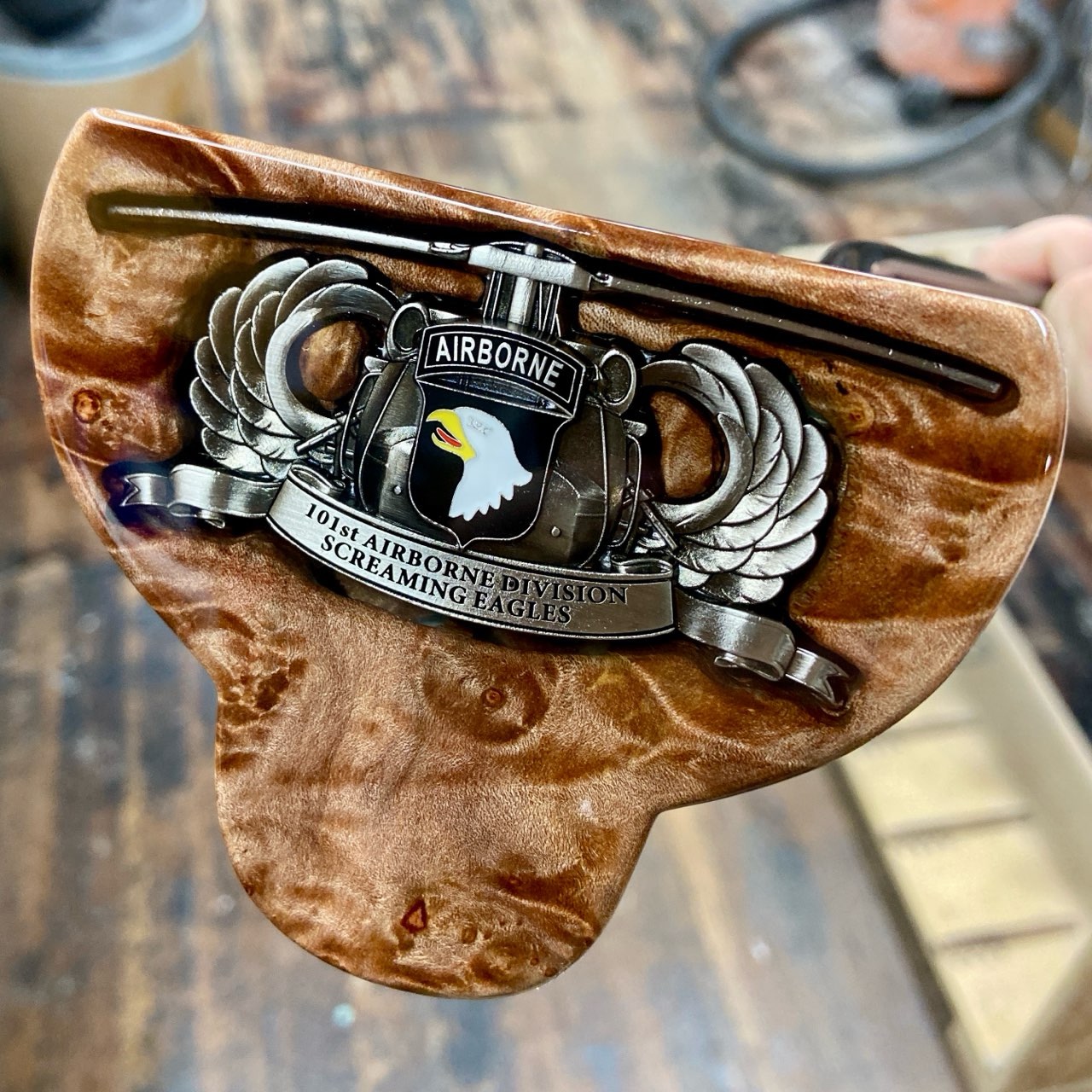 Custom Bradley putter with 101st Airborne Division Screaming Eagles challenge coin embedded in burl wood