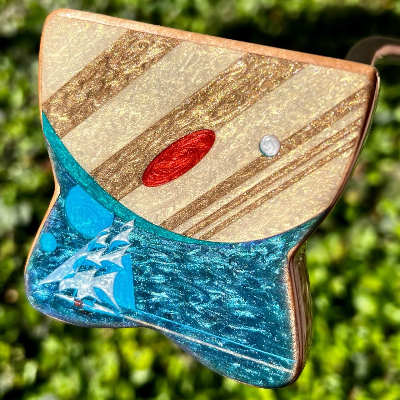 Custom Bradley putter with sailing ship and ocean scene crafted from wood and turquoise resin