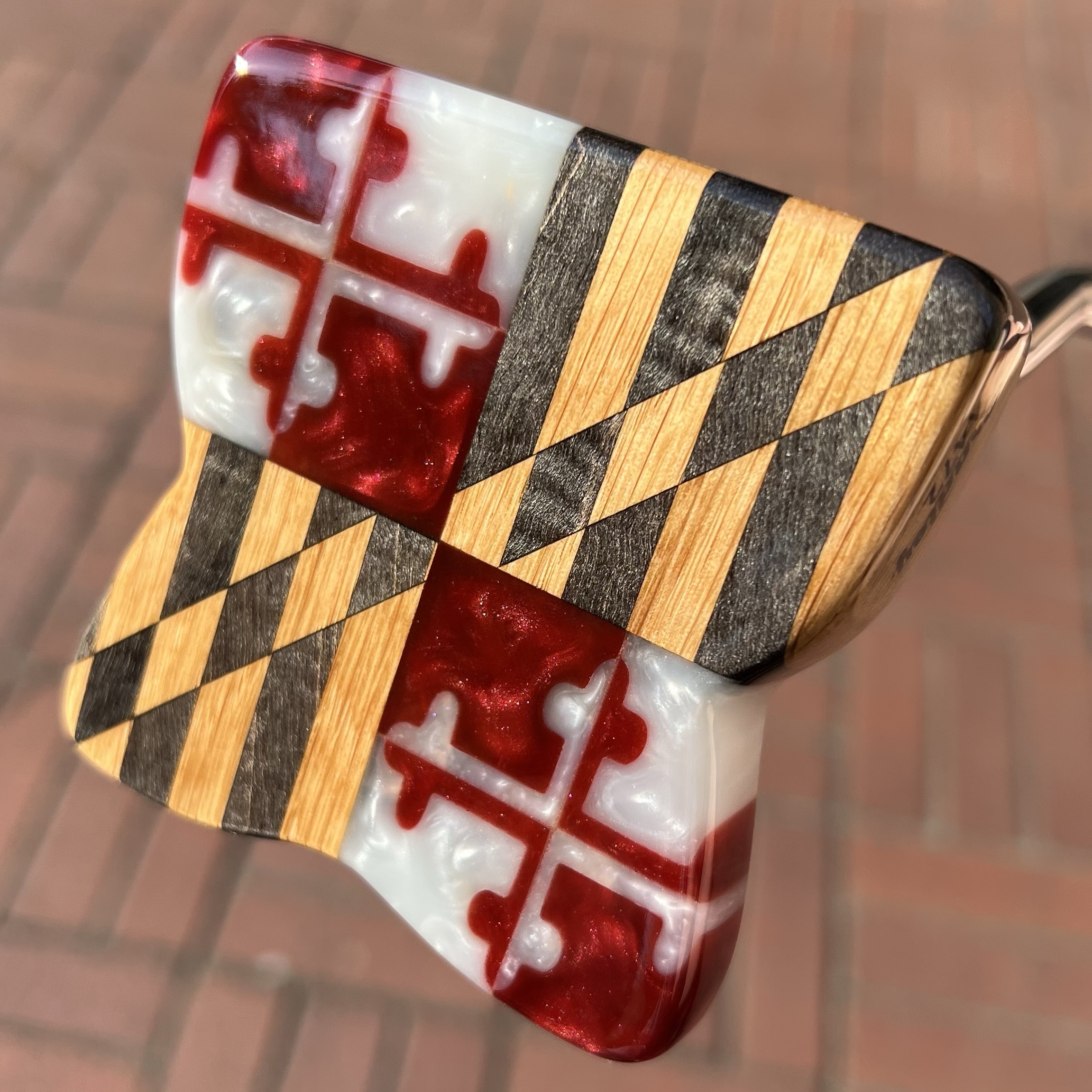Custom Bradley putter with Maryland state flag crafted from wood inlay and red resin